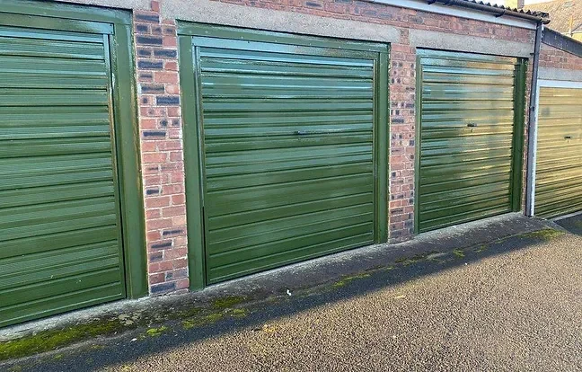 a small row of lock up garages