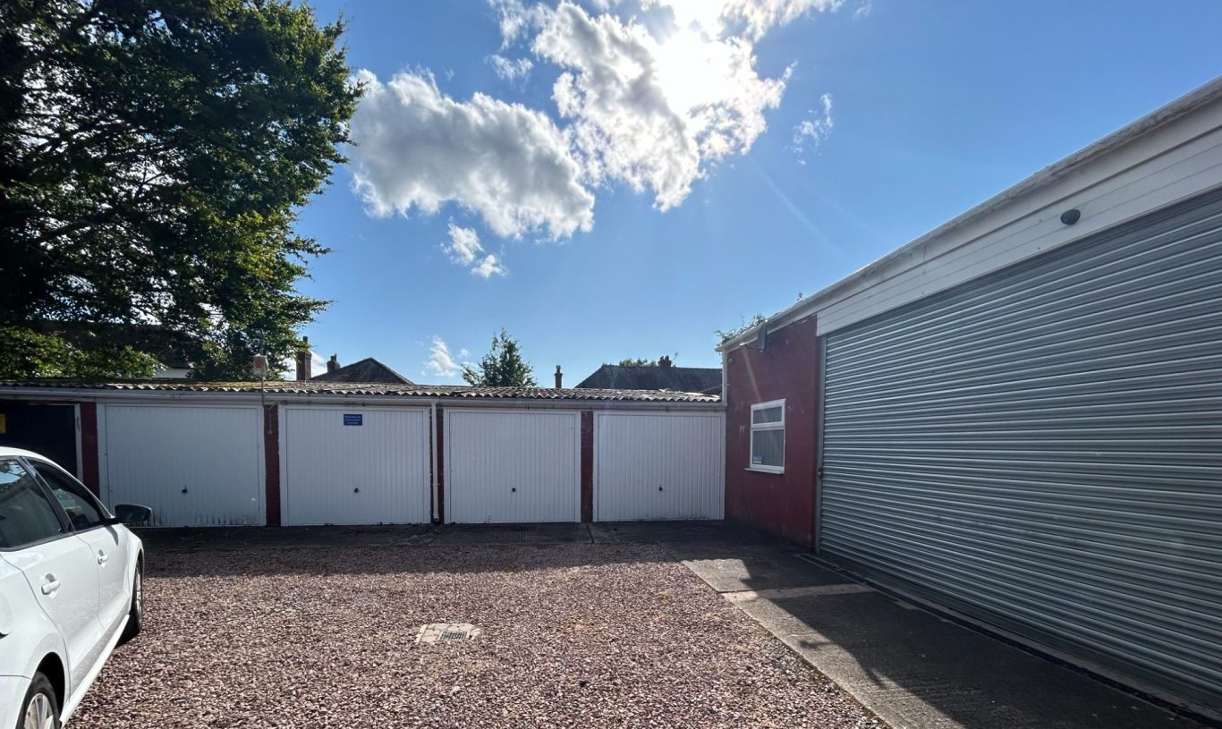 a garage compound with double size lock up garage