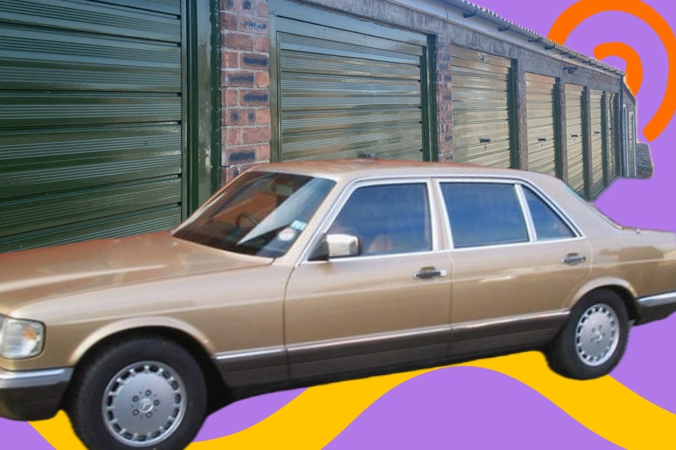 a classic car outside a lock up garage