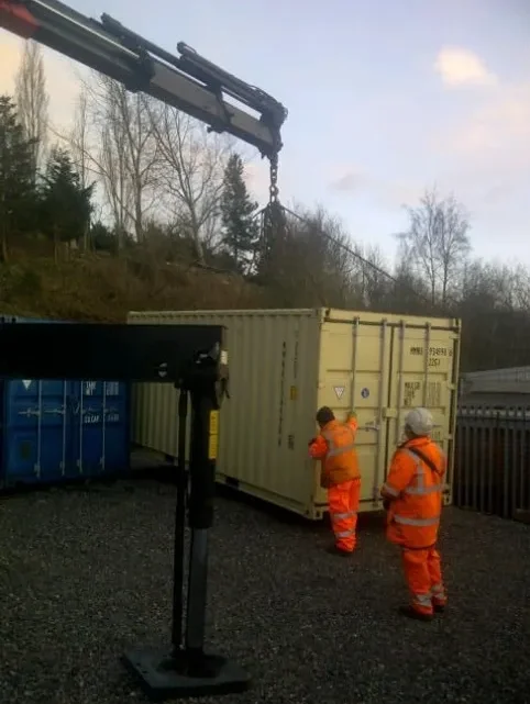 repositioning a shipping container