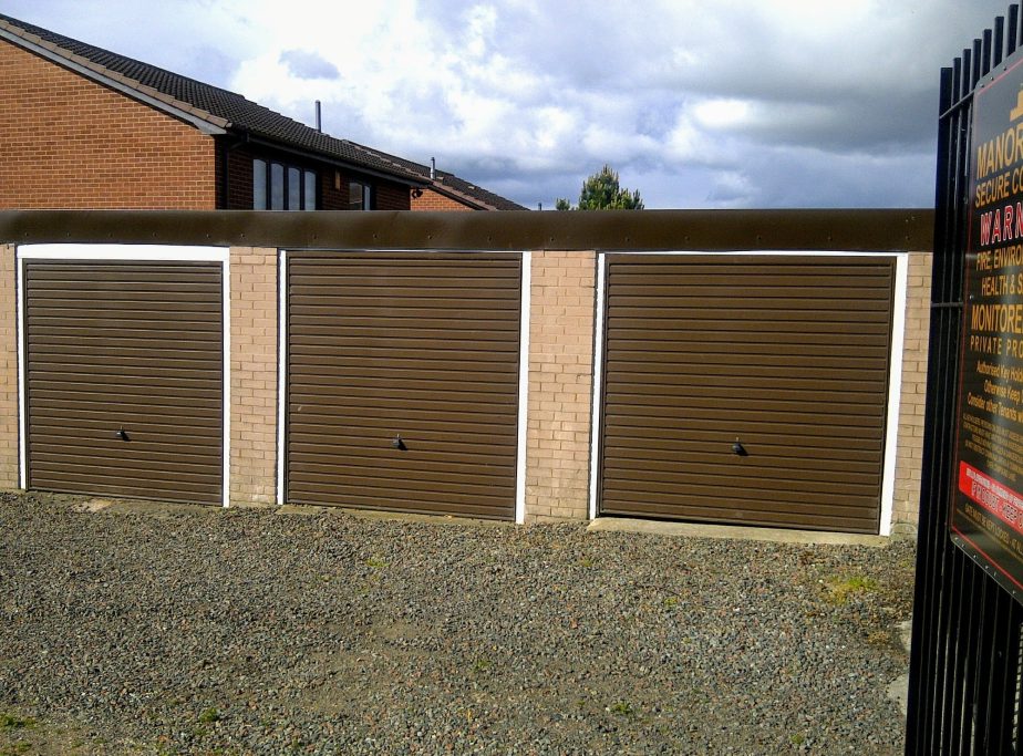 three lock up garages in a row