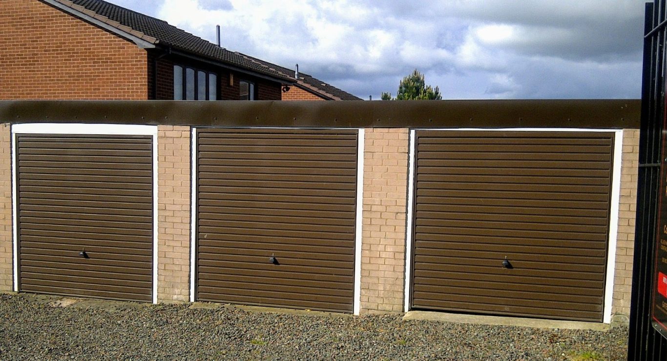 a row of three lock up garages