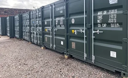 a row of shipping containers used for self storage 